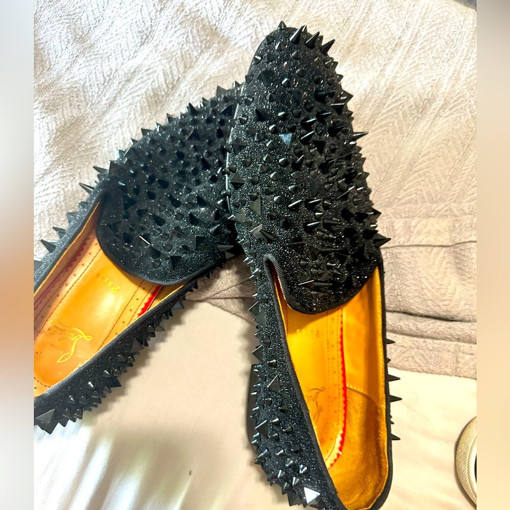 Christian Louboutin spiked dress shoe protective bottoms need be replaced